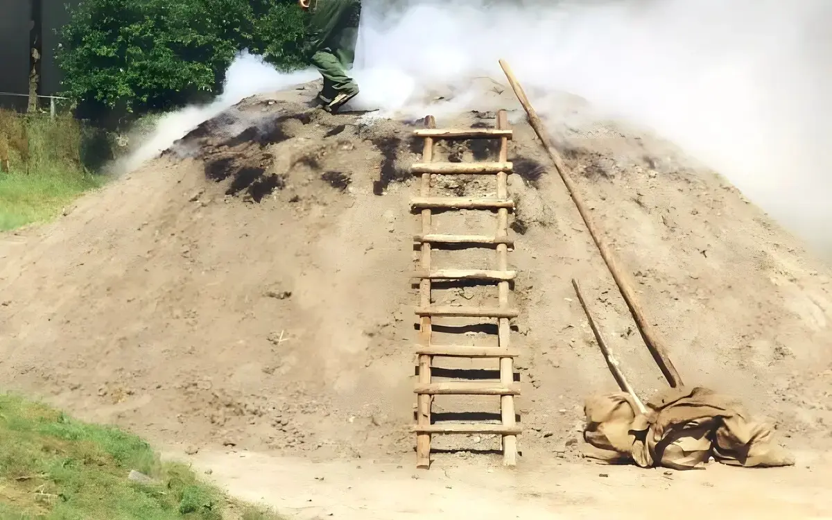 Schaedliche gase und rauch bei der holzkohleherstellung 068397e5