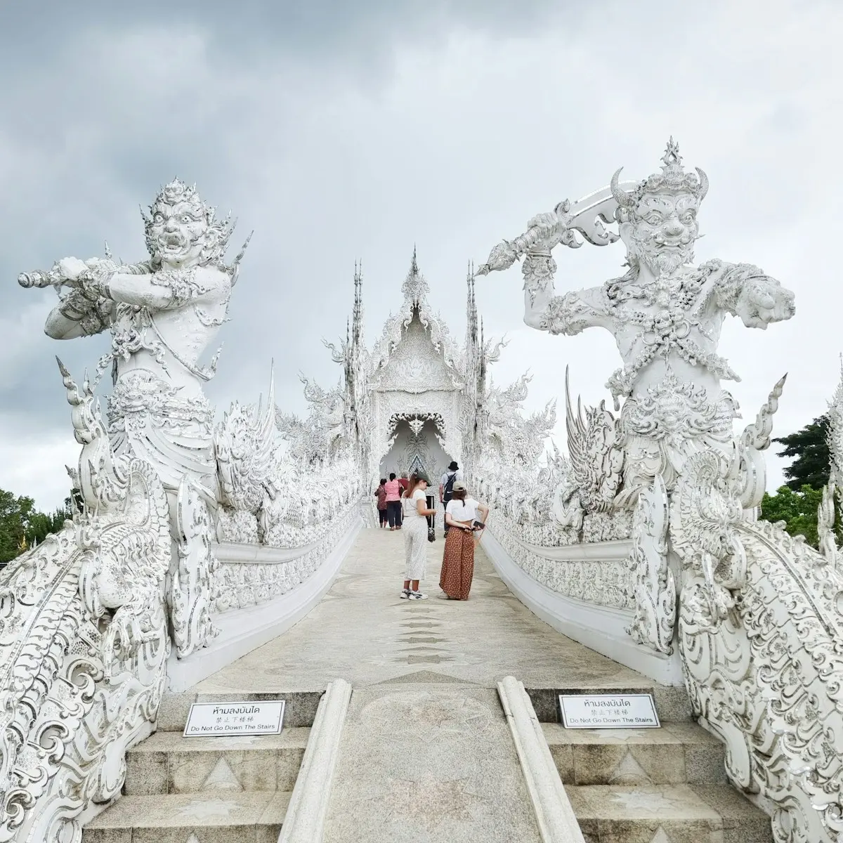 a group of people walking up stairs