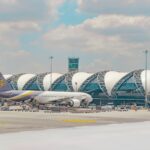 a large jetliner sitting on top of an airport tarmac