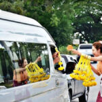 Warum Thais Blumen an Ampeln kaufen Warum Thais Blumen an Ampeln kaufen