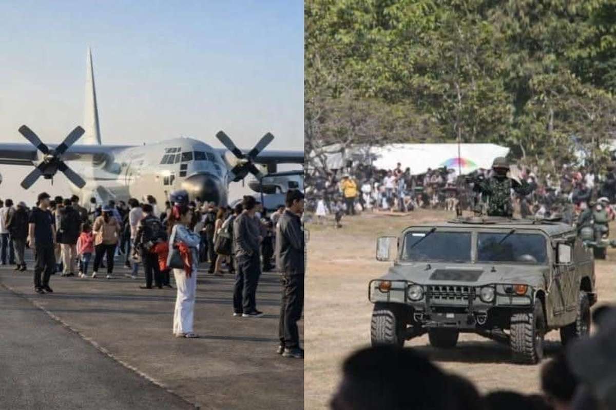Kinder bestaunen Panzer und Kampfjets